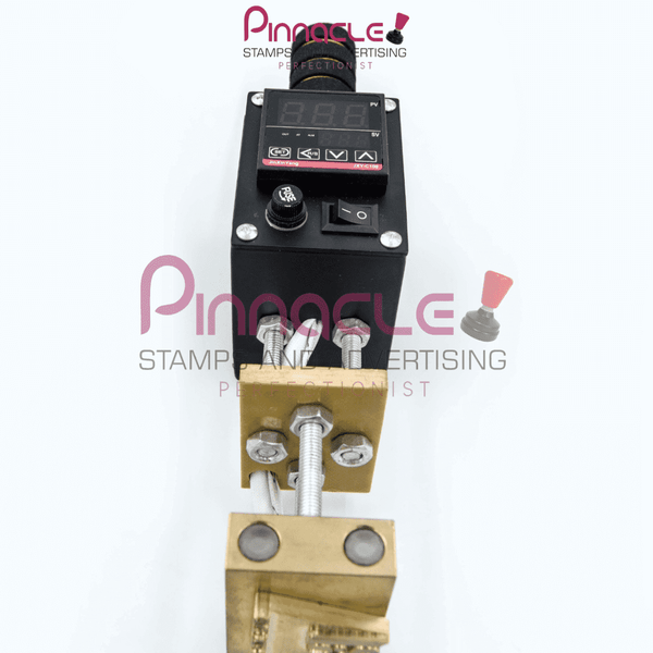 Electric food branding stamp for imprinting designs on food.